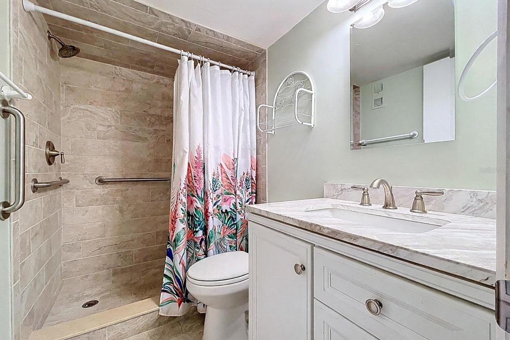 Photo of 9 Forbes Pl #310, Dunedin, FL 34698 (MLS # TB8479738)