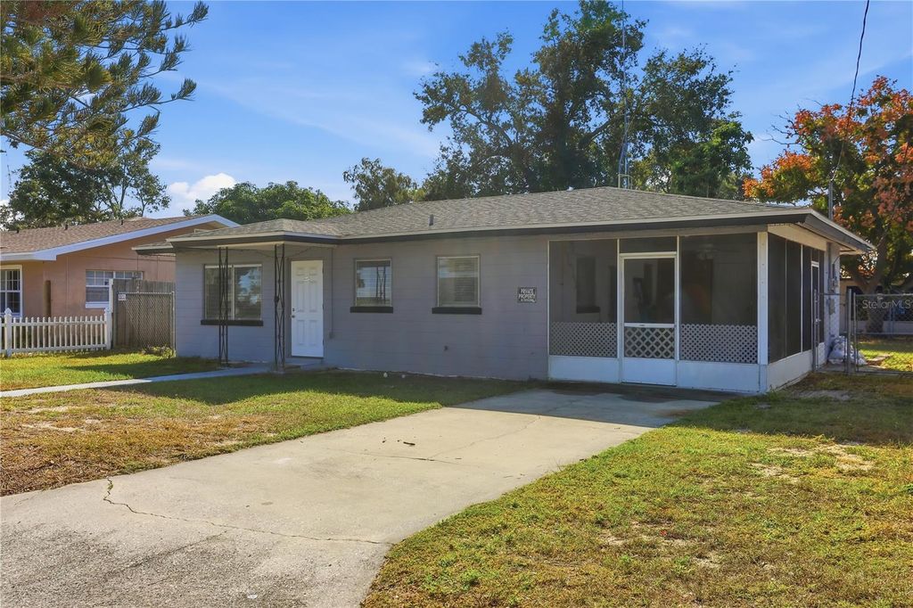 Photo of 225 E Pomelo Street, Lake Alfred, FL 33850 (MLS # S5139067)