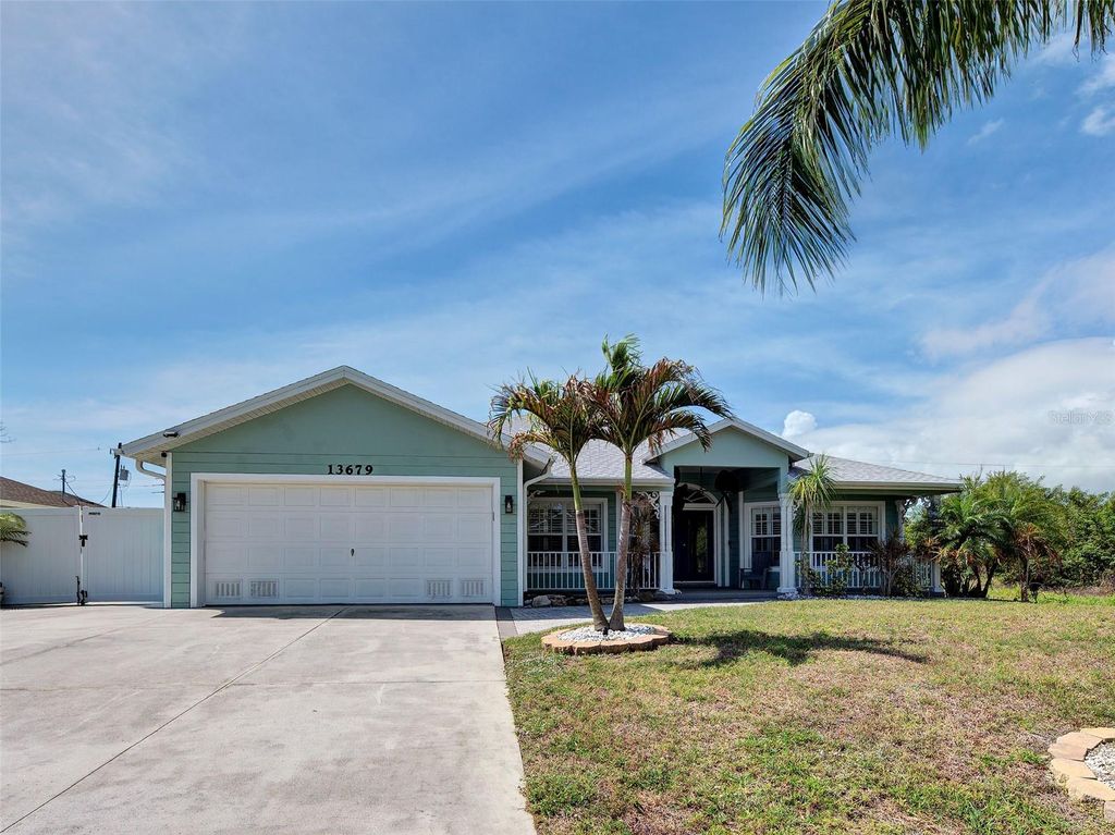 Photo of 13679 Drysdale Avenue, Port Charlotte, FL 33981 (MLS # TB8411231)