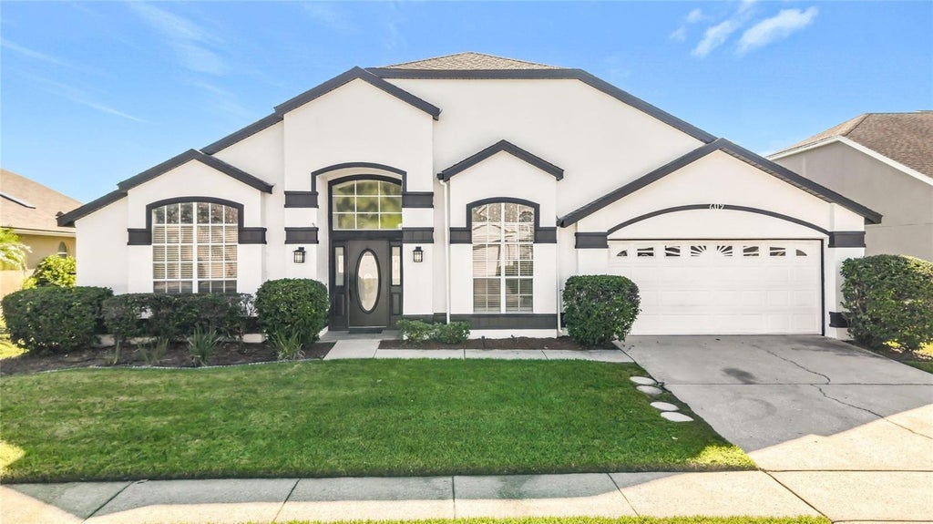 Photo of 609 Seascape Avenue, Orlando, FL 32828 (MLS # O6450582)