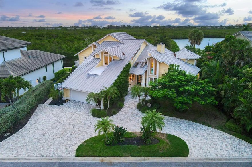 This stunning home is located on Siesta Key, known for its exquisite beaches, and offers direct access to the Intracoastal Waterway. With four balconies, you can enjoy breathtaking views of the water and downtown Sarasota skyline. The spacious living areas, including a Living Room, Great Room and Loft, perfectly complement the four bedrooms and bathrooms. Despite being originally built in 1977, the home has undergone significant upgrades in 2016, making it feel much younger. The gourmet kitchen is positioned elegantly, with a cozy breakfast nook and a grand dining room featuring a captivatingly designed wall. The Owner’s Suite is a peaceful retreat, complete with a balcony overlooking the pool and ICW, a luxurious bathroom, and a walk-in closet with custom shelving. Outside, you’ll find a travertine patio, a sprawling pool and a gourmet outdoor kitchen. Also, enjoy your very own private dock and 17lb lift where fishing is abundant, and dolphins and manatee can be seen frolicking right in front of you. Don’t miss the chance to make this extraordinary home your own slice of paradise.