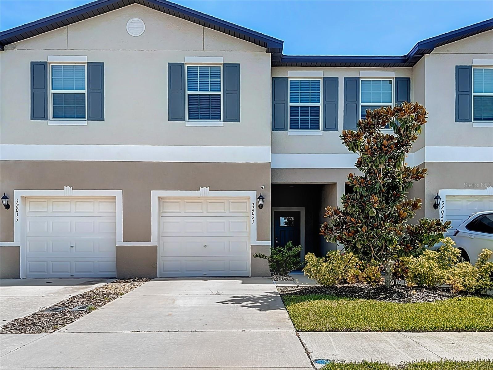 Why wait for New Construction? Welcome to 32021 Powderpuff Mimosa Dr—a beautifully maintained *like-new* 3-bedroom, 2.5-bathroom townhome located in the highly sought-after Mirada community of San Antonio, FL. Built in 2023, this two-story home offers a bright and open layout, spacious kitchen with modern cabinetry and stainless steel appliances, and a covered patio perfect for outdoor relaxation. The second-floor loft provides flexible space for a home office, gym, or play area, while the owner’s suite features a walk-in closet and beautiful full bathroom.
Enjoy exclusive access to the 15-acre Crystal Lagoon, the largest in the nation, offering swimming, kayaking, paddleboarding, swim up bar, live music and beachside fun. The community also features walking trails, a dog park, and a playground, with convenient access to I-75, new retail and dining areas, and a short drive to Wesley Chapel, Tampa, TPA International Airport and surrounding areas like the charming downtown Dade City!
This is your chance to own a move-in-ready home in a growing, amenity-rich neighborhood—schedule your private showing today!