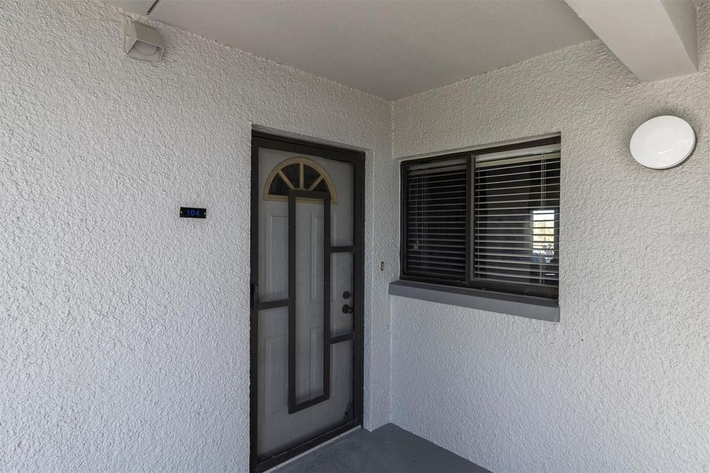 Photo of 4823 Ebbtide Lane Unit #104, Port Richey, FL 34668 (MLS # W7883904)