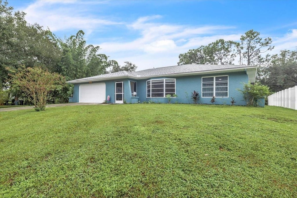Photo of 17341 Holmes Avenue, Port Charlotte, FL 33948 (MLS # C7531823)