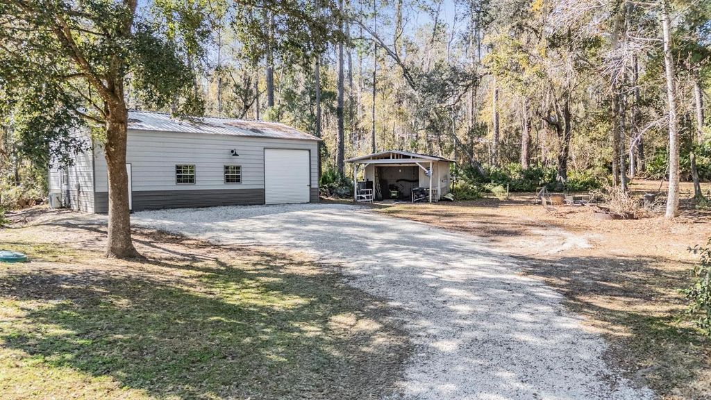Photo of 5079 Cedar Lane, Brooksville, FL 34601 (MLS # TB8477626)