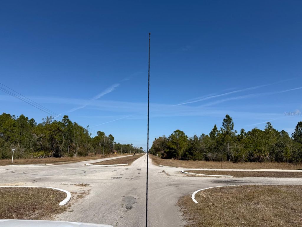 Photo of 923 Gaillardia Drive, Indian Lake Estates, FL 33855 (MLS # O6379238)