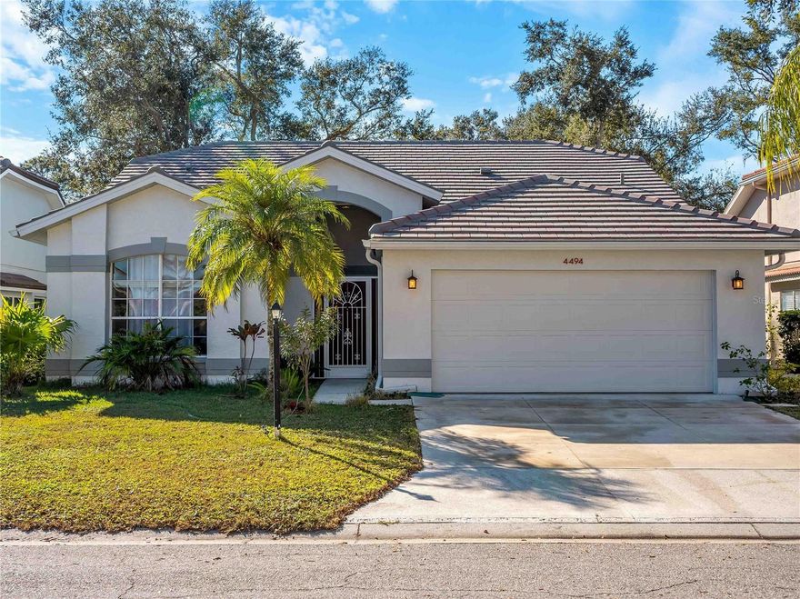 Location, Location, Location!  I know that saying is real estate cliche, but in this instance, it's absolutely true!  This beautiful 3 bedroom, 2 1/2 bath, 2 car garage home with heated pool is nestled against a preserve and located in the popular and highly sought after Longwood Run subdivision.  You're just minutes away from world famous beaches, first class shopping at UTC, medical facilities and a myriad of restaurants covering just about everyone's favorite dish.  Easy access to I-75, US 41 and just minutes to Sarasota Bradenton International Airport (SRQ).  Home updates worth noting include a new tile roof in 2020, kitchen cabinets & quartz countertops in 2025, primary, guest and pool baths all updated within the last 2 years and the pool was resurfaced in 2024.  The generous room sizes and easy flow of this home will draw you in, but the peace and tranquility found enjoying your pool area/outdoor living with gorgeous preserve views will make you want to stay!  One bedroom is currently being used as a den/office, but could easily have a closet added, if needed.  Primary bedroom offers sliders to the pool area along with 2 walk-in closets (hers and hers, LOL), ensuite bathroom with quartz countertops, soaking tub and stand alone shower stall.  An affordable HOA, superb location and a fabulous home. . . . what more could you ask for?  Schedule your private viewing today and make this home yours - before someone else does!