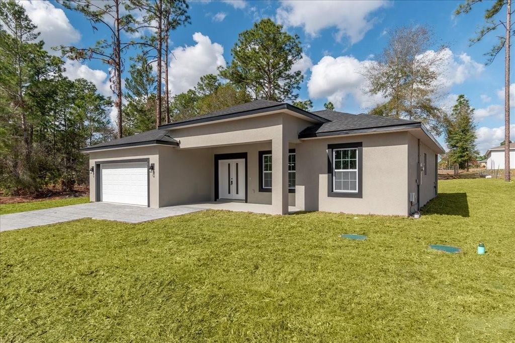 Photo of 1621 W Citrus Springs Boulevard, Citrus Springs, FL 34434 (MLS # S5144427)