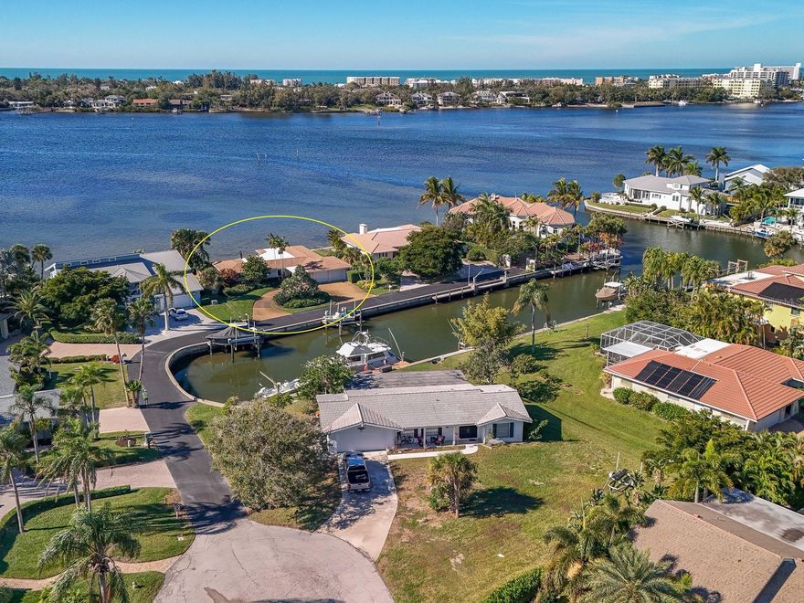 Sarasota Bayfront home with sweeping full bay views from all windows and door!  Do (or If) you love boating, but would prefer not to have your boat blocking your bay view, this rare property is for you! Baywood Way boasts a protected canal in front of the property, where your boat safely resides on the boat-dock/lift.  With easy access into the Intracoastal, you can head North to cruise along toward downtown/Lido/Longboat or South to restaurants and tiki bars. This custom decorated home has 2 bedrooms, 2 bathrooms with a den/office, 2 car garage off a circular drive and a private road on neighborhood peninsular. Bayfront seawall was replaced in 2022 and new roof installed in 2020! Located on the mainland and just minutes to famous Siesta Key Beach by boat, car or bike.  Also minutes to Sarasota Pavilion area of restaurants, shopping, Publix and the new World Market being built. Don't miss this rare opportunity to buy one of the only bay front homes on the market today!  Easy to see, call or text for your private showing.