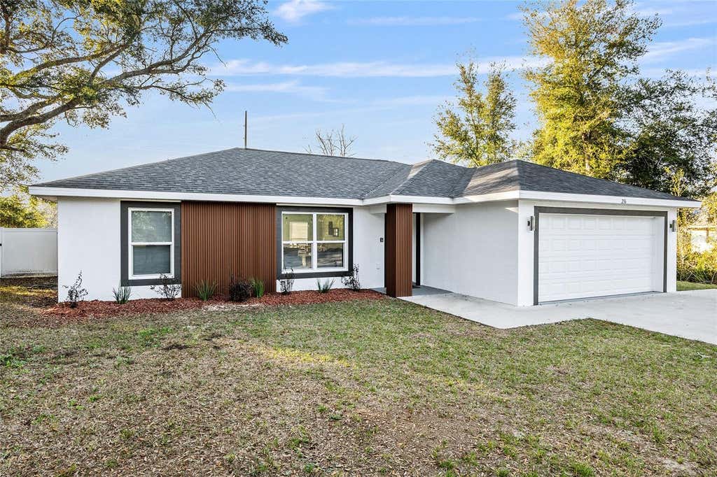 Photo of 7778 SW 146th Lane Road, Ocala, FL 34473 (MLS # OM726806)