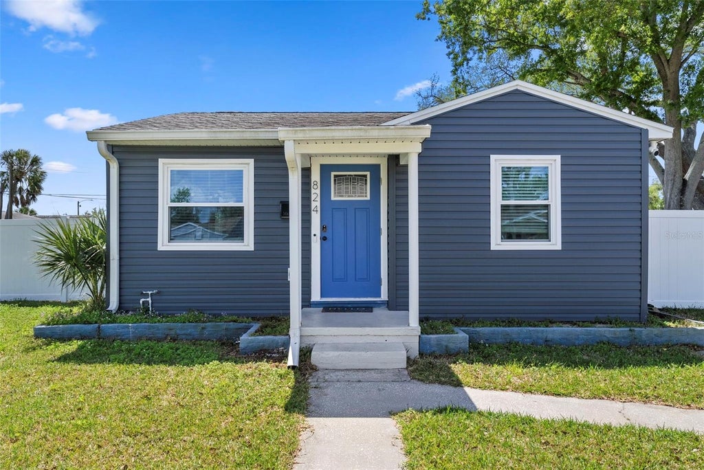 Photo of 824 61st Avenue NE, St Petersburg, FL 33703 (MLS # TB8557583)