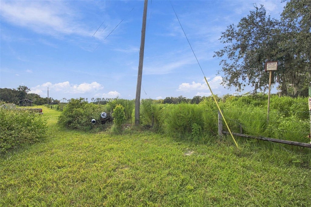 Photo of 8989 Ehren Cutoff, Land O Lakes, FL 34639 (MLS # TB8551544)