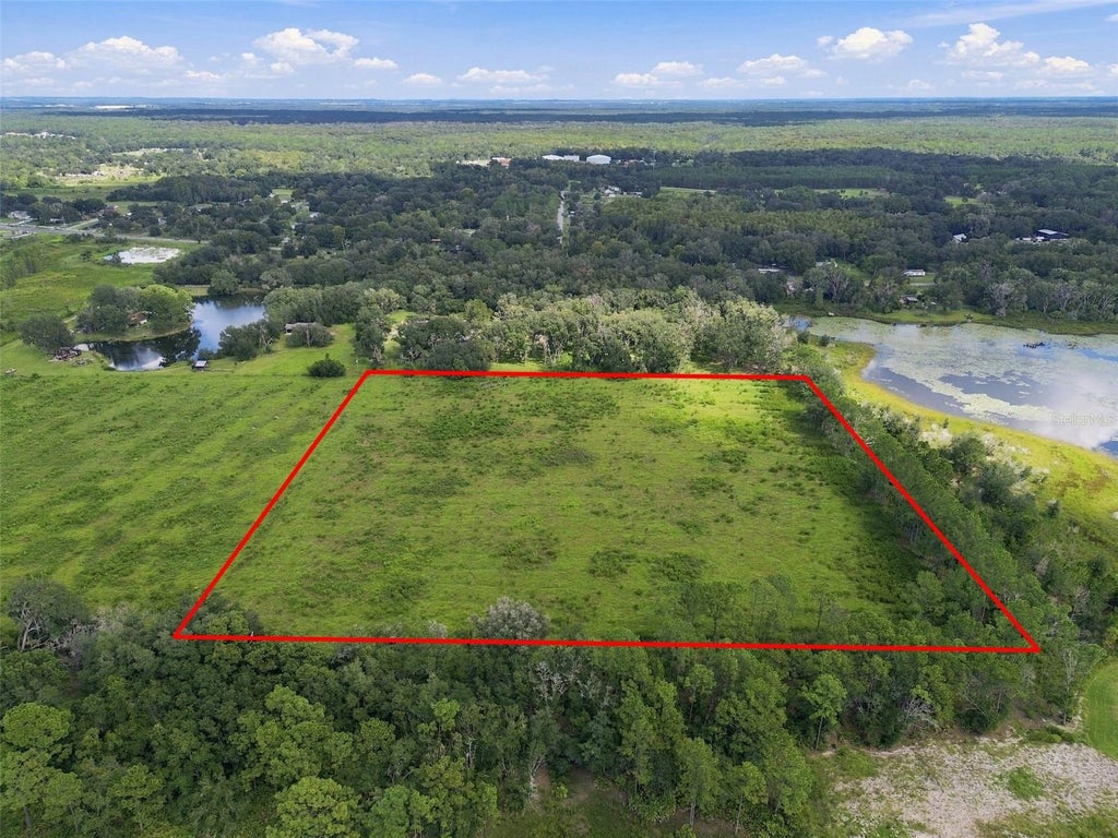Photo of 8989 Ehren Cutoff, Land O Lakes, FL 34639 (MLS # TB8551544)