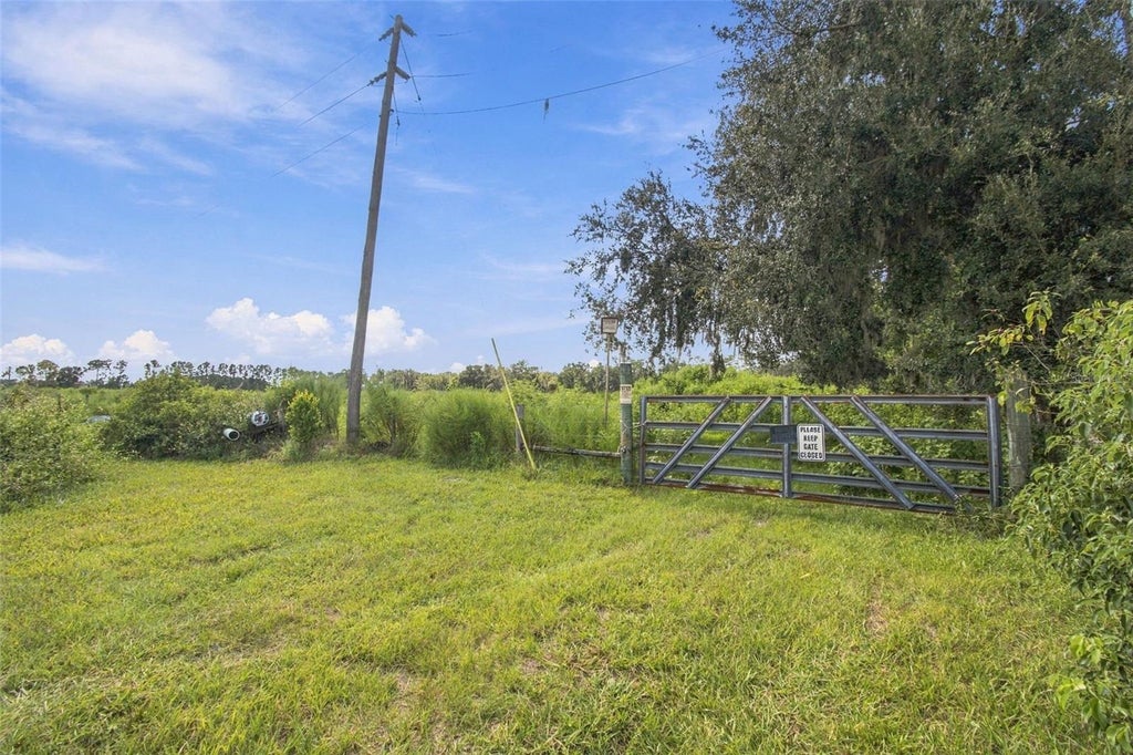 Photo of 8989 Ehren Cutoff, Land O Lakes, FL 34639 (MLS # TB8551544)