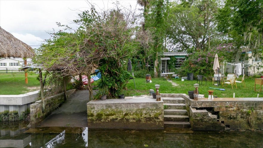 Waterfront Property – Direct Boat Ramp – No HOA – Your Gateway to Florida's Gulf Waters

Imagine stepping out your door to direct waterfront access with your own boat ramp – no HOA, no restrictions, just pure Florida boating freedom. Located in a calm neighborhood, this property offers immediate access to the Intracoastal and Gulf of Mexico, perfect for the avid boater or angler.

An exceptional opportunity for investors and builders. Property sold cash only, requires full rehab or rebuild.