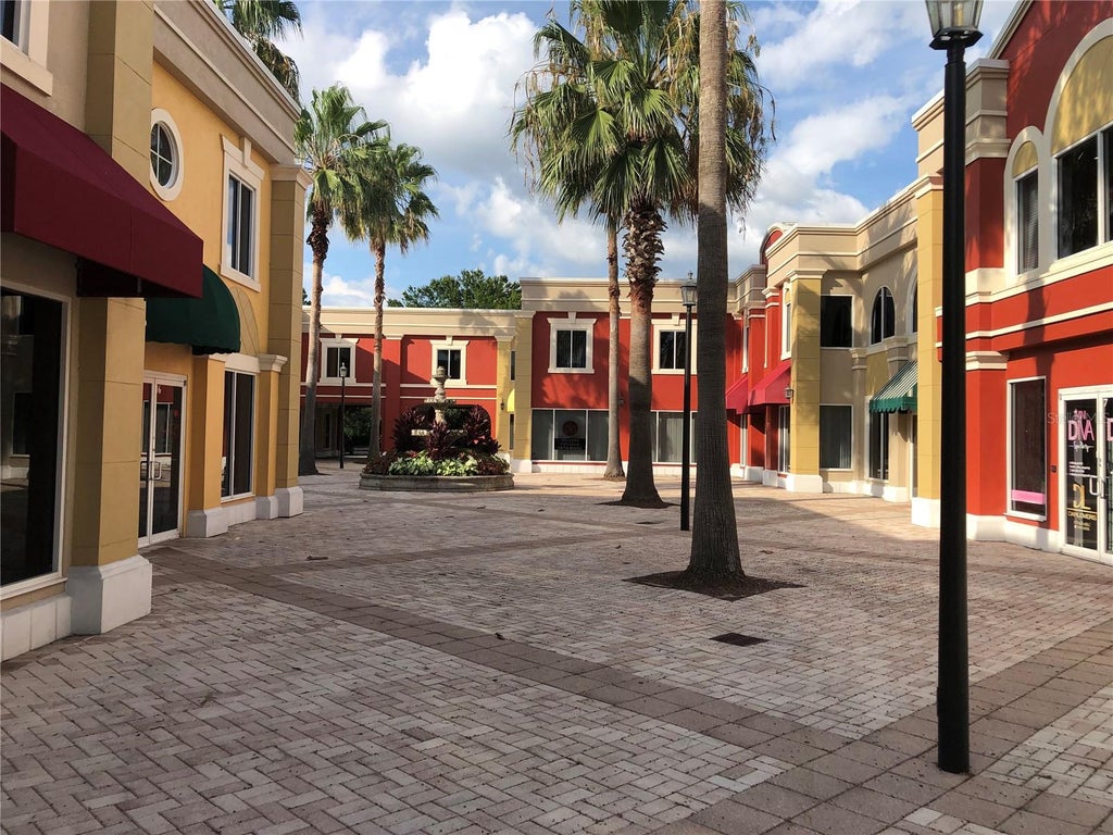 Photo of 2151 Consulate Drive #15, Orlando, FL 32837 (MLS # O6429605)
