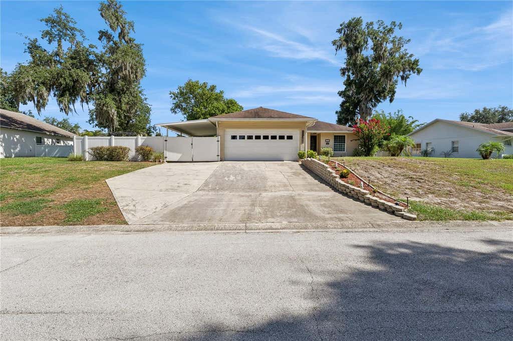Photo of 7050 Scenic Hills Boulevard, Lakeland, FL 33810 (MLS # P4939065)
