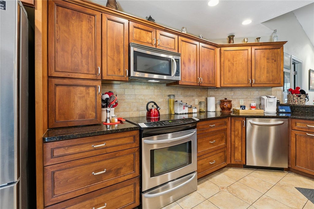 Photo of 7050 Scenic Hills Boulevard, Lakeland, FL 33810 (MLS # P4939065)