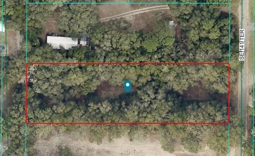 Enjoy the best of both worlds on this superb 1.17-acre buildable lot. Tucked away on a quiet property that feels like the country, yet not far from town, this spacious parcel is the perfect place to design and build your dream home.