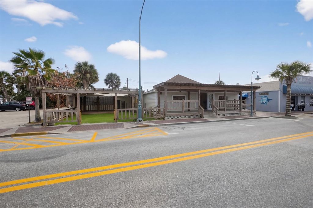 Photo of 411 Flagler Avenue #A, New Smyrna Beach, FL 32169 (MLS # NS1087883)