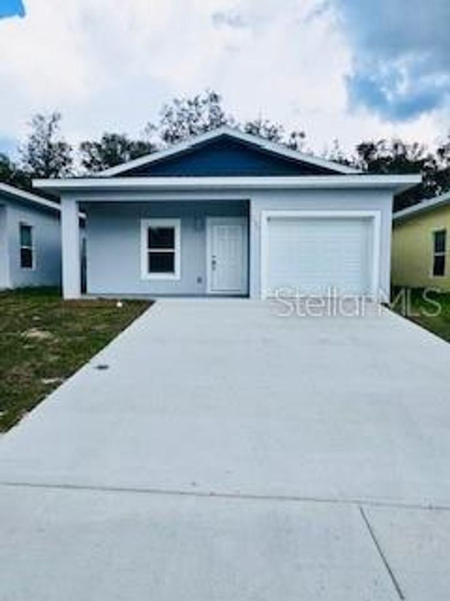 One or more photo(s) has been virtually staged. NEW CONSTRUCTION 2025 CONCRETE BLOCK IN SEBRING FLORIDA. 3/2 WITH GARAGE IN A GATED COMMUNITY. Las Villas Homes is a gated community with a play area and recently refurbished swimming pool, spa, play area, dog park. Pets welcome. Enjoy a brand new concrete block construction home. Vinyl floor throughout, high 9.4 ft ceilings, blinds in every room, A/C and celling fans. Walk in closet and linen cupboard. This home benefits from a private double driveway and garage, main sewer (not septic), recessed lighting, 4 x stainless steel appliances including a double-door fridge freezer, microwave, stove oven range and dishwasher. Soft-close high quality kitchen cabinets, a large master bedroom with double sinks in bathroom and large walk in closets. Surge protectors included. Las Villas Homes is conveniently located in the quiet neighborhood near schools, Lake Jackson, close to grocery stores, restaurants, shopping and Advent Health/ Highlands Regional Hospital. It's also close to downtown city services, the police station and the Sebring International racetrack. Other outdoor amenities nearby include, fishing, watersports, golfing, sandy beaches. Sebring is centrally located approx. 1.5 hours south from Orlando, 1 hour from Lakeland and 1.5 hours Tampa. Florida Sun.