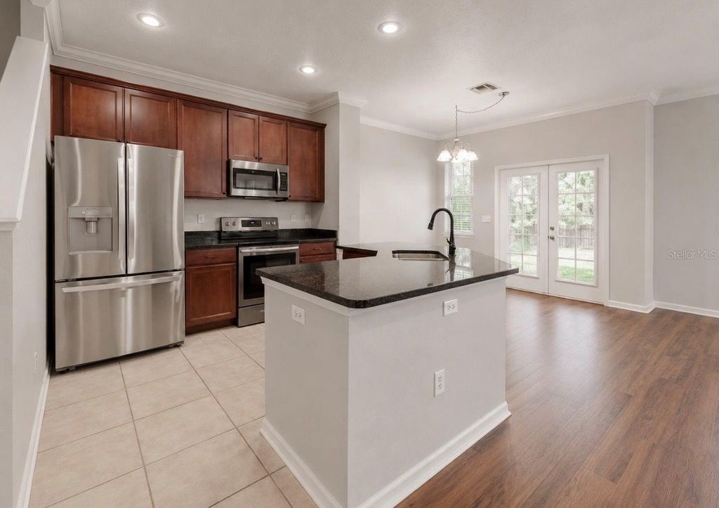 Photo of 7539 Tamarind Avenue, Tampa, FL 33625 (MLS # TB8512465)