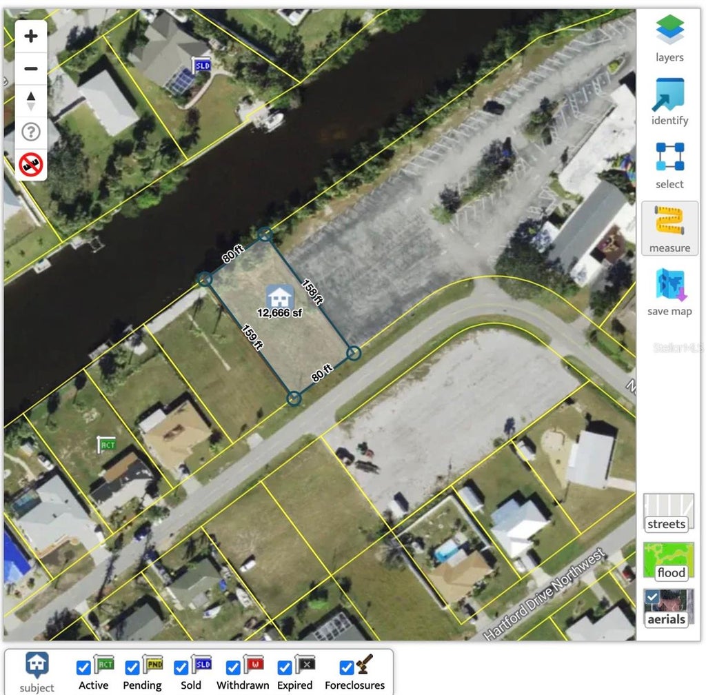 Photo of 838 Spring Lake Boulevard, Port Charlotte, FL 33952 (MLS # A4705213)
