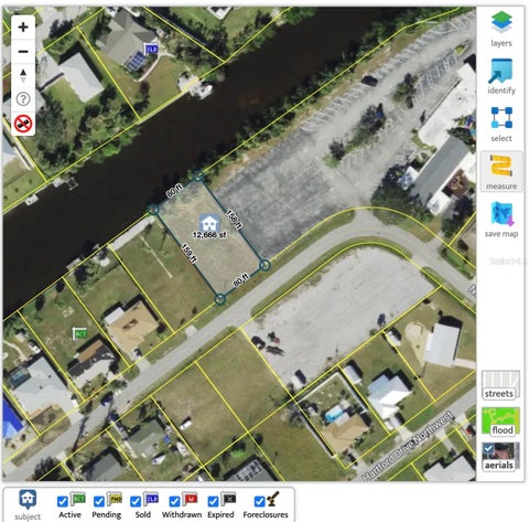 Photo of 838 Spring Lake Boulevard, Port Charlotte, FL 33952 (MLS # A4705213)