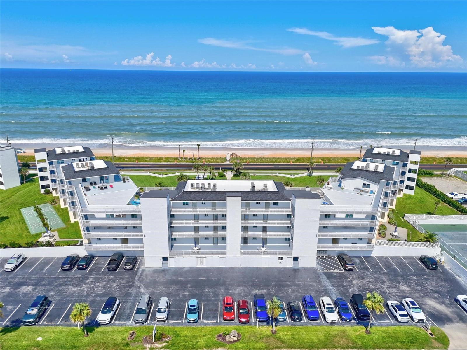 Short Sale. Wake up to the rhythmic sound of the waves and the breathtaking spectacle of the sun rising over the Atlantic Ocean. Welcome to Unit 203 at the lovely Ocean Beach Club, where direct, unobstructed oceanfront views are not just a feature, but a way of life. This is more than a home; it's your personal seaside retreat in the heart of charming Flagler Beach.
Step inside this exceptional two-level residence and be greeted by an expanse of cool, elegant tile flooring that flows through the main living area—perfectly suited for the coastal environment. The open-concept design allows the stunning ocean panorama to be the centerpiece of your daily life. Sliding glass doors bathes the space in natural light and opens onto your private balcony, an idyllic setting for morning coffee as you watch for dolphins, whales, and shrimp boats or evening cocktails under the stars.
The well-appointed kitchen is a model of both style and function, featuring gleaming solid surface countertops, ample cabinetry, and a layout that makes entertaining a breeze. Adjacent to the main living space, you'll find the convenience of a guest half-bath and a dedicated in-unit laundry area, thoughtfully designed to maximize comfort.
Ascend to the second level, where tranquility reigns. The primary suite is a true sanctuary, offering a private, elevated view of the endless ocean horizon. It features a spacious layout and a private en-suite bathroom, creating a serene escape from the everyday. A second generous bedroom, complete with its own full bathroom, provides a comfortable and private space for family or guests.
Life at Ocean Beach Club extends beyond your front door. Take a refreshing dip in the sparkling community pool or enjoy private access that leads you directly onto the cinnamon-colored sands of Flagler Beach. You are just moments away from the town's eclectic mix of local eateries, unique shops, and the iconic Flagler Beach Pier.
This is a rare opportunity to own a piece of paradise where every day feels like a vacation. Don't let this coastal dream slip away. This is a short sale, all sales terms require lender approval