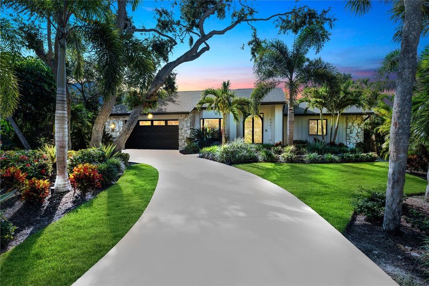 Experience tranquility and peace of mind in Siesta Key! Located in the highly sought-after neighborhood of Siesta Cove, this 4-bedroom, 2.5-bath home has been meticulously maintained and generously updated. The current owners completed extensive renovations including a newly remodeled primary bathroom, a custom locally handcrafted iron front door, and stunning iron interior doors with switchable privacy glass in both full baths. 

Peace of mind is paramount here: the home features new hurricane-rated windows, doors, skylights, and garage door. Further structural updates include a new flat roof connecting to the pool cage with new wood framing and super gutters. Additional upgrades include a conversion to a heated saltwater pool system, pre-wiring for security cameras, elegant alabaster chandeliers, a new Café dishwasher, and more. Situated at a high point on Siesta Key, this home experienced no flood water intrusion or damage during the historic 2024 hurricane season, with all improvements completed by the current owners prior to Hurricanes Helene and Milton. 

The split-bedroom floor plan features pocket sliding doors throughout that practically vanish to offer seamless integration with the sprawling, travertine-floored screened lanai and pool—perfect for entertaining or filling the house with fresh Florida air. Mature tropical landscaping surrounds the home, accentuating the outdoor oasis while providing exceptional privacy. Inside, cathedral ceilings and skylights amplify the spacious, open atmosphere. From the kitchen’s quartz countertops, solid wood cabinetry, gas cooktop, and stainless appliances to the stunning granite-accented gas fireplace, every inch of this home exudes quality craftsmanship and luxury. 

You will love the large laundry room, fully equipped with a sink and cabinetry matching the kitchen's high standards and aesthetic. The fourth bedroom is a private retreat located above the spacious, high-ceiling two-car garage; fully permitted by the current owners, it features its own mini-split system for comfort. Additional conveniences include a whole-home water softener, reverse osmosis kitchen filter, irrigation system, and outdoor shower. With glowing landscape lighting and the colorful Florida sky, this home is absolutely stunning at twilight. The icing on the cake is the location—just one mile from pristine beaches! Make an appointment today to experience the perfect balance of form and function in this incredible Siesta Key home.