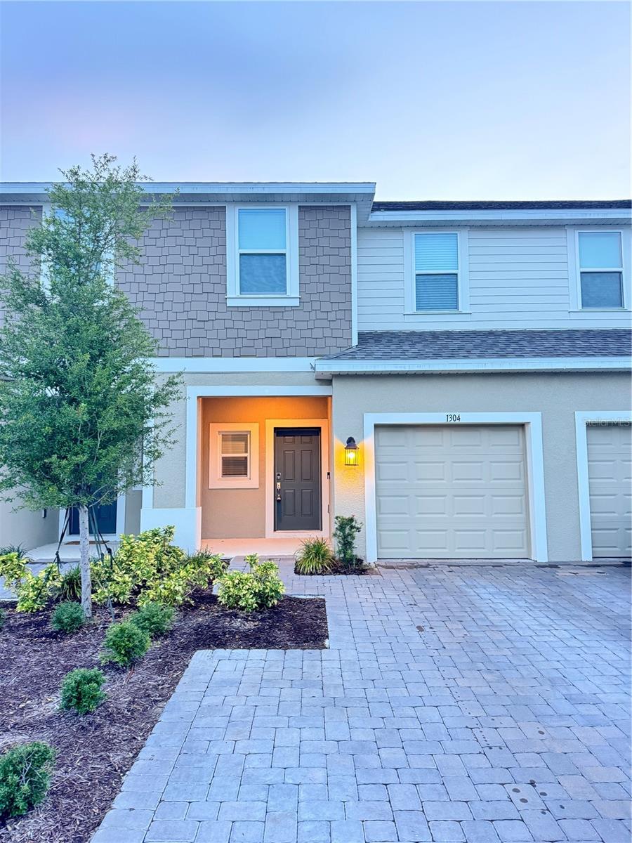 Beautiful Nearly New Townhome – Only One Year Old! This bright and modern townhome features a spacious living area and an open-concept kitchen that creates a warm and airy atmosphere. The central island serves as the perfect spot for both cooking and entertaining.
Enjoy a generously sized backyard, ideal for relaxing or hosting guests. The first floor also includes a convenient half bath and a one-car garage. Upstairs, two bedrooms share a full bathroom, while the large primary suite offers a walk-in closet and dual vanities for added comfort. You'll love the ample storage options, including a pantry in the kitchen, under-stair storage, a separate laundry room, linen closet, and closets in all bedrooms. Don’t miss out on this opportunity – schedule your tour today!