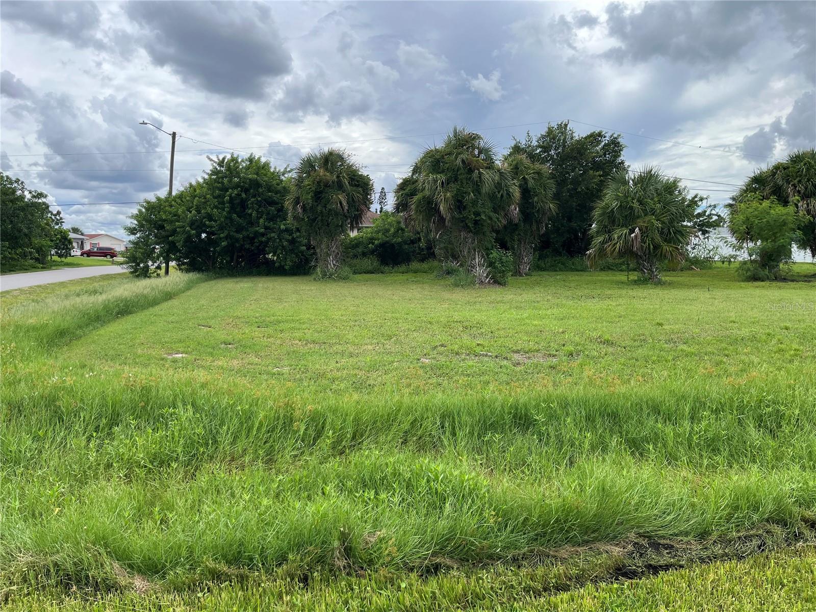 Corner LOT!! This corner lot is ready for you and your dreams. Close to shopping, restaurants, and beaches. This is LOT 11.