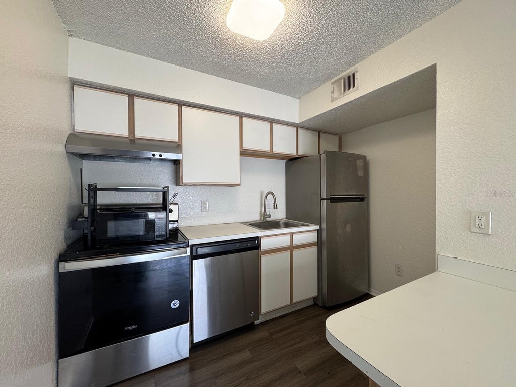 Photo of 2213 Grand Cayman Court #1136, Kissimmee, FL 34741 (MLS # O6449817)