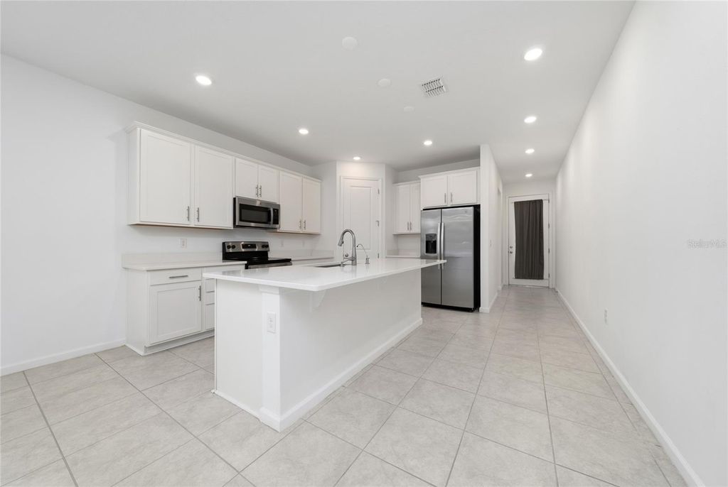 Photo of 1133 Mattie Pointe Boulevard, Auburndale, FL 33823 (MLS # S5140385)