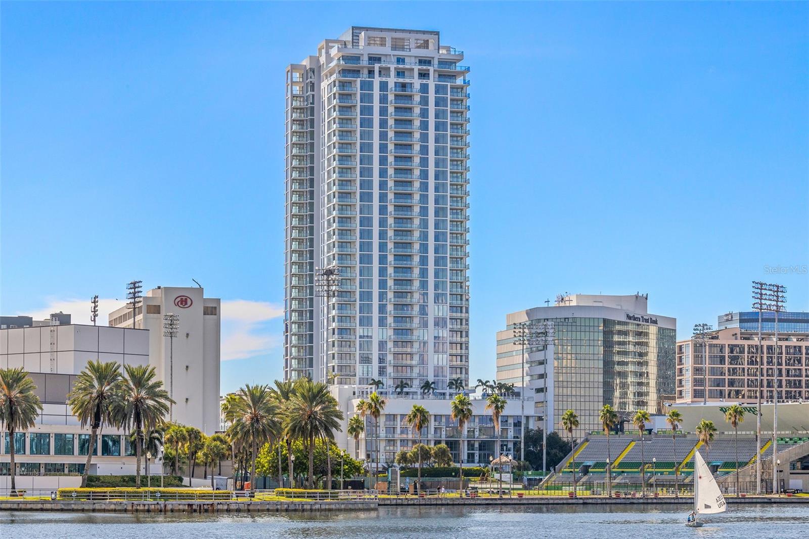 Unveiling Saltaire - Downtown St. Pete's Epitome of Luxurious Living, ideally situated in the vibrant heart of downtown St. Petersburg. Saltaire stands as a remarkable testament to contemporary architectural excellence and elevated urban living. This cutting-edge luxury high-rise redefines city life, presenting an unparalleled fusion of elegance, convenience, and sophistication. With its striking modern design, Saltaire seamlessly integrates into the city's skyline, establishing a new benchmark for opulent living spaces. This meticulously designed, never-before-occupied two-bedroom, three-bathroom PLUS DEN floor plan now boasts a $50,000 upgrade, elevating your living experience with an array of premium features. Revel in the spacious living areas, soaring ceilings, and designer finishes complemented by two expansive terraces. The gourmet kitchen is equipped with top-of-the-line stainless steel appliances, including a 42” built-in refrigerator, microwave/convection oven, electric cooktop, stainless steel canopy hood, and front-load washer & dryer. Imported European cabinetry and quartz countertops add a touch of luxury, while the entire residence features upgraded multi-zone auto blinds, ensuring seamless control of natural light in every room. Two bedrooms showcase blackout blinds for added privacy and comfort. The sponsor's upgrade encompasses floor and wall electric outlets, an under-counter wine cellar, and a chic tile floor throughout the residence, creating an atmosphere of unparalleled refinement. On the 7th-floor amenity deck, residents can immerse themselves in a myriad of luxuries, including a resort-style pool, Whirlpool spa, expansive deck with cabanas, fire pits, and relaxation areas, a state-of-the-art fitness center, a spacious social room for gatherings, and a Club Bar with a catering pantry for special events. An artificial turf recreation area featuring a dog park and complimentary wireless internet access in social areas further enhance the Saltaire experience. Beyond these resort-quality amenities, Saltaire prioritizes security with round-the-clock surveillance, controlled building access, and a concierge and valet service for both residents and guests. Situated in the heart of downtown St. Pete, Saltaire provides unmatched access to the city's vibrant arts and culture scene, dining hotspots, waterfront parks, and upscale shopping. Your new home is strategically located near Al Lang Stadium for Tampa Bay Rowdies soccer games and the St. Pete Pier for local events. Saltaire transcends being just a residence; it's a lifestyle that heightens your senses, offering a haven of luxury in the bustling city center. Immerse yourself in the allure of modern living at its finest. Don't miss the opportunity to secure your place in this exclusive sanctuary of upgraded luxury.