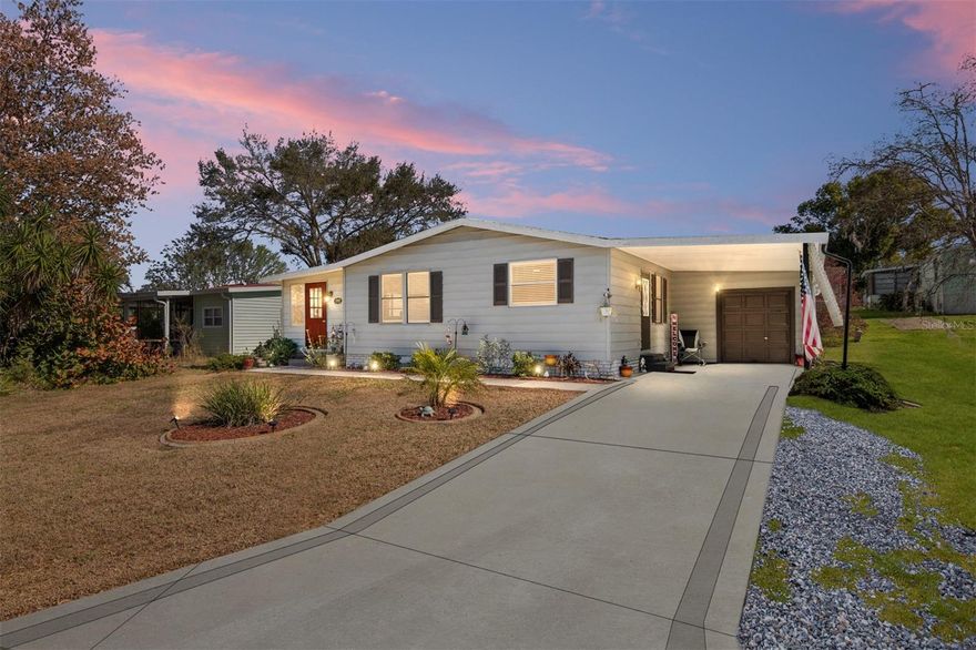 Welcome to this COMPLETELY UPDATED home in Orange Blossom, The Villages. MOTIVATED SELLER & DID I MENTION THE HOME IS BEING OFFERED FURNISHED! There is no bond, no CDD, and the roof has been replaced. It is conveniently located minutes from Spanish Springs Town Square, which is close to your shopping needs, plenty of restaurants, and entertainment. The shingle roof was installed in 2023, the luxury vinyl flooring was installed in 2023 as well. The kitchen has been fully updated, with GRANITE COUNTERS, TILED BACKSPLASH, AND NEWER STAINLESS STEAL APPLIANCES. Off of the living room is a bright, comfortable ENCLOSED LANAI. Primary bedroom is spacious, as well as the guest bedroom which could double as a office if needed. The open floor plan flows nicely and the home has fresh modern paint. From the 2 space carport, the storge room/laundry room is roomy enough to double as a golf cart garage for convenience. Painted driveway & mature landscaping. What are you waiting for this home is move in ready, call today for your tour.