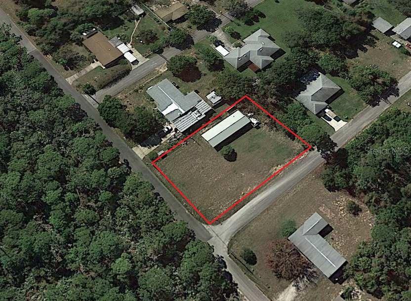 LARGE LOT WITH 60 X 20 CONCRETE BLOCK GARAGE, POWER AND WATER ON SITE. GREAT START FOR HOME SITE OR USE FOR STORAGE. BUILDING HAS ROLLUP DOORS ON BOTH ENDS, METAL ROOF, SOME BUILD OUT AND FINISH WORK DONE INSIDE. ALSO SO HAS ELECTRIC AND PLUMBING. LOT IS 206 X 164, ALMOST A HALF ACRE AND ON QUIET STREET CLOSE TO RIVER, BURNS CHARTER SCHOOL, AND PUBLIC PARKS.