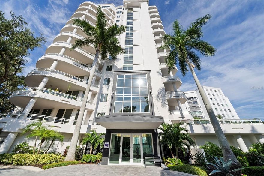 PANORAMIC WATER VIEW OF SARASOTA BAY AND NEWLY RENOVATED! Welcome to Tessera, located on the historic and iconic Palm Avenue in Downtown Sarasota. One of the rare opportunities to experience sky living with a highly sought after full water view of Sarasota Bay, the yachts at Marina Jacks, the John Ringling Causeway Bridge that leads to the barrier islands of St. Armand’s, Lido Key, Longboat Key and breathtaking sunsets daily. This residence has a highly sought after view with a location that is has an eclectic mix of art galleries, one of a kind finds and the vibrance of living in a quaint neighborhood with easy access to anywhere in the downtown area, making this the epitome of luxury living in Sarasota. This 3 bedroom, 2.5 bath plus den and a two-car garage is offered at $3,395,000. This newly renovated condo with semi-private access to its location on level 8 has been perfectly and professional designed all throughout. The grand double doors with detailed panels open to a spacious foyer that immediately showcases a water view. The primary bedroom is privately located and separate from the guest en-suite bedroom. It includes features such as a spacious en-suite sanctuary off the primary bedroom. Offering a vanity area that includes beautiful crystal lighting, a quartz countertop, brushed nickel hardware and a beveled mirror. There are two walk-in closets with built-in shelving, an Ove soaking tub with handheld sprayer, a rain shower head with multiple functions, that also include a massage feature. This en-suite bathroom offers natural light which is not always found in many other condos.The primary bedroom has built-in reading lights, room for a reading chair and access to the terrace to enjoy the sunrise with your favorite cup of coffee. The luxury vinyl light oak flooring throughout creates consistency and flow to the residence. The second bedroom has an en-suite bathroom with accent walls that includes wallpaper that elegantly ties in the finishing color palette. The vanity with granite counter top has plenty of storage, double sconce lighting and overhead recessed lighting. The shower has beautiful floor to ceiling porcelain tile, an ANZZI shower head, sprayer and advanced settings. Access to the outdoors is also available with a private terrace that includes a water view. There is a powder room conveniently located for guests. The vanity has a quartz countertop, VIGO faucet, sconce l lights on the side of the mirror plus an overhead chandelier. A third guest bedroom with double doors could be utilized in a variety of ways. There is also a room that is perfect for a den or library. The living room has a panoramic view of Sarasota Bay.  It is the perfect place for entertaining friends and family. The kitchen is designed with the most functionality possible. Since it is semi-open to the great room, it also provides an inviting way to keep prepared meals behind the scenes when entertaining. There is counter seating for two at the island, a dry bar area for pouring and serving your favorite house wine from the Sub-Zero wine tower and a walk-in pantry for storing non-perishable items. The GE oven has multiple functions such as convention and air frying. There is also a stainless-steel Wolf Range that provides optimal ventilation when preparing meals. There is also the added benefit of accessing the terrace from the kitchen as well. MAKE YOUR NEXT MOVE EXCEPTIONAL! Schedule your private showing with Lisa Otte soon.