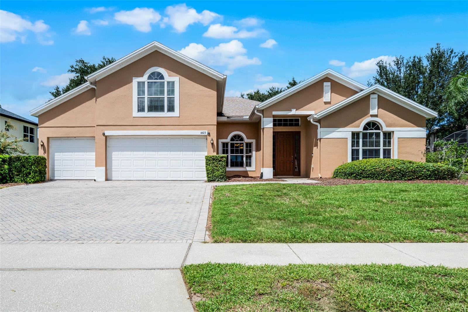 Live the Florida lifestyle you’ve been dreaming of in this gorgeous property in Apopka! This 4-bedroom, 3-bathroom home with a bonus loft and home office space offers the perfect balance of elegance, comfort, and flexibility, all on a generous 0.3-acre corner lot with golf course views. From morning coffee on the screened-in lanai to evenings spent hosting friends in the formal dining room, every detail of this home is designed for connection and enjoyment. The versatile front living room could be used as a private office, making it easy to host clients without interrupting family life. The kitchen, with its expansive counters, bonus island, breakfast bar, and crown-molded cabinetry, flows seamlessly into the open living area so you’re never far from the conversation. A nearby bonus room and upstairs loft provide endless options! Whether you need a study nook, media room, play space, or creative studio, this home has plenty of space to be tailored to the needs of your family. At the end of the day, retreat to the primary suite where private lanai access, dual walk-in closets, and a spa-inspired bathroom awaits. Boasting dual vanities, a soaking tub, and a walk-in shower this bathroom makes relaxation effortless. Additional bedrooms are spacious, bright, and inviting, giving everyone a place to feel at home. Outdoors, the screened lanai invites you to unwind pest-free while enjoying golf course views, and the spacious backyard is perfect for family fun, weekend barbecues, or letting four legged friends roam freely. Beyond your backyard, adventure and convenience await! Explore nearby Wekiwa Springs and local parks, enjoy boutique shopping and dining in downtown Apopka or Mount Dora, and take advantage of easy access to highways for a quick commute. With Disney and Universal less than 40 minutes away, and with everything you need close by, this home offers not just a place to live, but a lifestyle filled with relaxation, recreation, and connection. Don't wait to make this stunning home your own, start to envision your new life here and schedule a private showing TODAY!!