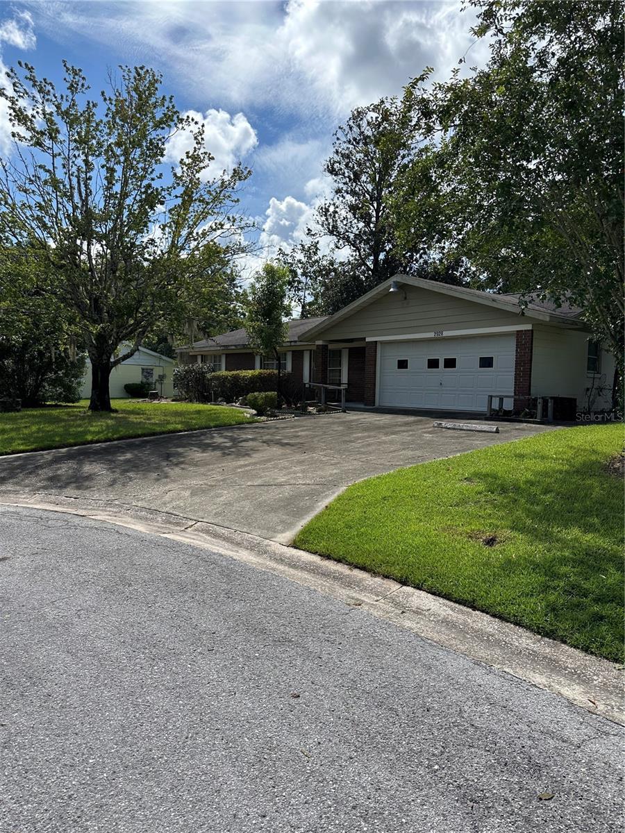 Welcome Home to your friendly neighborhood and Cul-De-Sac Living. This is a wonderful home for a small family or retired folks. 3 bedrooms, 2 baths, with full livingroom, dine in kitchen, screened patio and covered patio, wonderful backyard. Great mature trees and potential for a beautiful garden area. Interior of this home has some amazing Old Ocala Charm and tons of potential to add your own personal charm. This really could be your personal canvas for your creative hopes and dreams.