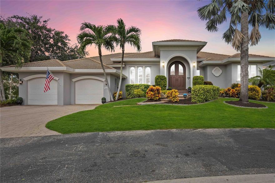 Welcome to your dream waterfront oasis at Harbour Landings in historic Cortez, Florida! This luxurious custom-built home, crafted by renowned builder Steve Titsworth of Shoreline Builders, offers an unparalleled living experience in the exclusive gated community of Harbour Landings. Boasting 3,000 square feet of exquisite living space, this 3-bedroom, 3-bathroom residence is exceptional. 

Located on a deep water canal, this home presents a unique opportunity for boating enthusiasts. Included with the property is a deeded boat slip and a 10,000-pound lift, providing effortless access to the sparkling waters of the Gulf of Mexico. Imagine setting sail from your own backyard and embarking on endless aquatic adventures.

Situated less than 1 mile away from the world-renowned beaches of Anna Maria Island, this home offers the perfect blend of coastal serenity and convenient access to sun, sand, and surf. Spend your days basking in the warm Florida sun, strolling along pristine shores, or indulging in a variety of water sports. 

As you step inside, you'll be greeted by an ambiance of refined elegance. The interior boasts travertine floors imported from Italy, tray ceilings, and stunning maple cabinets, creating an atmosphere of timeless sophistication. The spacious layout provides ample room for relaxation and entertainment, while the large windows and sliding glass doors frame breathtaking water views.

With 100 feet of water frontage on a sprawling 1/4-acre lot, this home offers a private sanctuary where you can unwind and immerse yourself in nature's beauty. The canal leads to a secluded basin, where playful manatees and other fascinating sea animals frolic, providing a truly enchanting experience.

In addition to its luxurious features, this home is equipped with solar panels valued at nearly $30,000, significantly reducing monthly energy costs. Embrace eco-friendly living while enjoying the utmost comfort and convenience.

Beyond the confines of this extraordinary property, you'll discover the rich history and charm of Cortez village. Immerse yourself in the vibrant local culture, explore the quaint shops, and savor delectable cuisine at the nearby restaurants. With shopping, dining, and entertainment options just moments away, you'll have everything you need right at your fingertips.

Don't miss this rare opportunity to own a slice of paradise in Cortez, Florida. Embrace the coastal lifestyle, indulge in luxurious amenities, and create memories that will last a lifetime. Your waterfront dream home awaits!