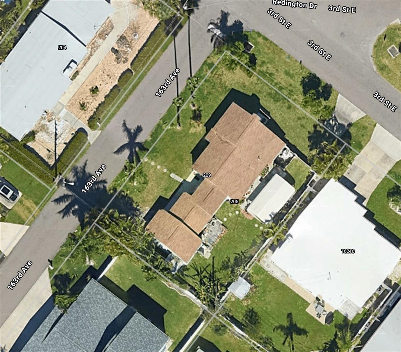 TWO BLOCKS FROM THE BEACH.....INTERCOASTAL WATER VIEW........CORNER LOT..........BUILDER DREAM..........Just two blocks from the sugar-white sands of Redington Beach, this rare 70 x 100 ft lot sits on a quiet coastal street lined with multi-million dollar homes. It’s a prime opportunity to design and build your dream beach retreat in one of the Gulf Coast’s most coveted neighborhoods. Whether you're envisioning a luxury vacation home or a full-time residence by the sea, the oversized lot offers space, flexibility, and an unbeatable location to bring your vision to life. The existing 2-bedroom structure holds a touch of vintage charm, but the true value lies in the land and the lifestyle it unlocks.
From the second floor, enjoy expansive views of the Intracoastal Waterway, while the front of the property provides peekaboo glimpses of the Gulf—a constant reminder that the ocean is only moments away. Imagine starting your mornings with a beach walk, spending your afternoons on the water, and ending each day with a sunset over the sea. Opportunities like this—a large, buildable lot with water views, just steps from beach access in a high-end coastal community—are incredibly rare. This isn’t just a lot. It’s the foundation for your next chapter in paradise.