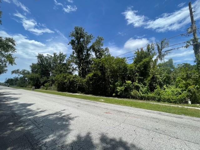 Investors! This 0.62-acre lot near East Orlando’s Wedgefield area is a rare find with city water, septic, and power already on site—a major cost and time saver. The existing mobile home is uninhabitable and must be removed at the buyer’s expense, making this an ideal teardown and rebuild opportunity. With no HOA, flexible zoning, and strong demand for rental and resale properties in the area, this is a prime spot for your next project. Quick access to SR 528, beaches, shopping, and Orlando International Airport adds even more value.