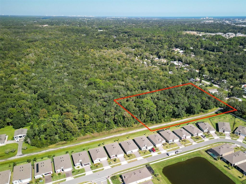 Photo of 1521 Ocuan Trail, New Smyrna Beach, FL 32168 (MLS # NS1086206)
