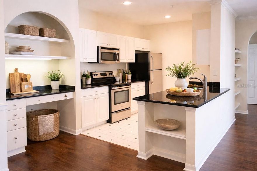 Stunning 2/2 Pool View Condo with Chimney and Wood Floors @ Park North Downtown. Fully equipped and renovated kitchen with granite counter tops and stainless steel appliances, generous walk-in closet space, washer and dryer, new wood floors in all areas. 2 assigned parking and visitor parking available, with electronic key to buildings and garage. Central mail room. Amenities include a private fountain courtyard with tropical plants and plant trees, upscale club room with pool table, big screen TV, party facilities with kitchen &amp; bar available for resident functions. Condo also includes a state of the art exercise and fitness room, breathtaking tropical 2 pool areas, business center with computers &amp; Internet access. In the heart of Downtown Orlando within walking distance to Lake Ivanhoe, Antique Row, shopping,&amp; restaurants.