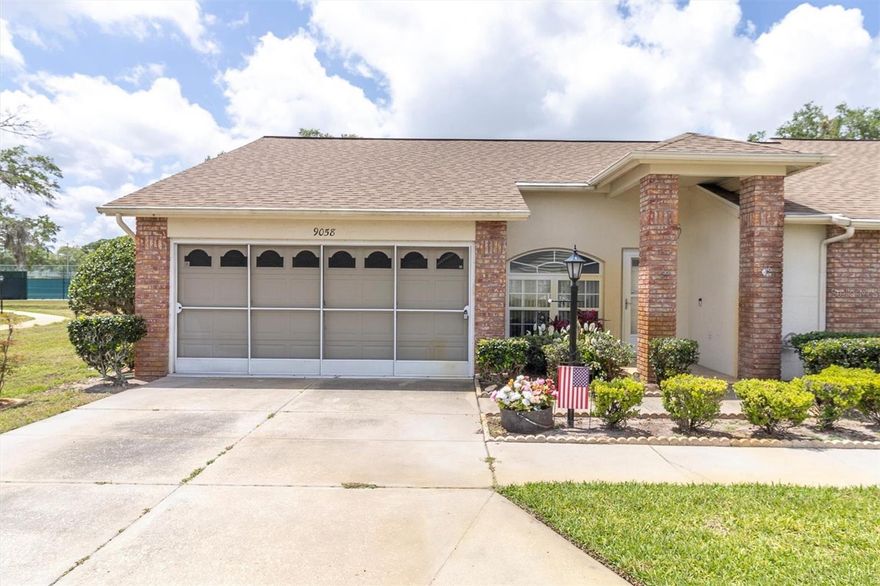 LOCATION, LOCATION, LOCATION! THIS HIGHLY SOUGHT AFTER 2/2/2 CONDO IN TOP SHAPE IS IDEALLY LOCATED ON A CORNER LOT JUST STEPS FROM THE ACTIVE CLUBHOUSE IN ONE OF TRINITY'S MOST POPULAR AND  AFFORDABLE  OVER 55 COMMUNITY'S!  PRICED SHARP! HESITATE....AND YOU'LL BE TOO LATE!  YOU'LL LOVE THE LARGE OPEN ROOMS FLOODED WITH NATURAL LIGHT AND VERSATILE GREAT ROOM  STYLE FLOOR PLAN.  THE EAT IN KITCHEN IS LINED WITH NEW NEUTRAL CABINETS TOPPED BY GLEAMING GRANITE COMPLETE WITH APPLIANCES.  IT OPENS TO THE FAMILY ROOM.  THE PRIMARY BEDROOM IS A GENEROUS SIZE AND FEATURES LARGE WALK-IN CLOSET AND A PRIVATE BATH WITH EVERYONE'S FAVORITE DUAL SINKS AND STEP IN SHOWER!  THE GUEST BEDROOM IS CONVENIENTLY  ADJACENT TO THE GUEST BATH.  THE BACK PAVERED PATIO  COMES IN HANDY!  A TWO MINUTE WALK TO THE CLUBHOUSE IT FEATURES MORE ACTIVTIES THAN YOU CAN KEEP UP WITH!  HEATED POOL & SPA, TENNIS CTS, PICKLEBALL,  BOCCE, SHUFFLEBRD, POOL & BILLIARD ROOM, LIBRARY, CARD ROOM, EXERCISE CLASSES. DANCES, PARTIES, BBQ'S AND MORE!   ALL THIS AND THE AMENTIES THAT THE TRINITY AREA OFFERS, IT JUST CAN'T BE BEAT!  RUN TO THIS ONE!
