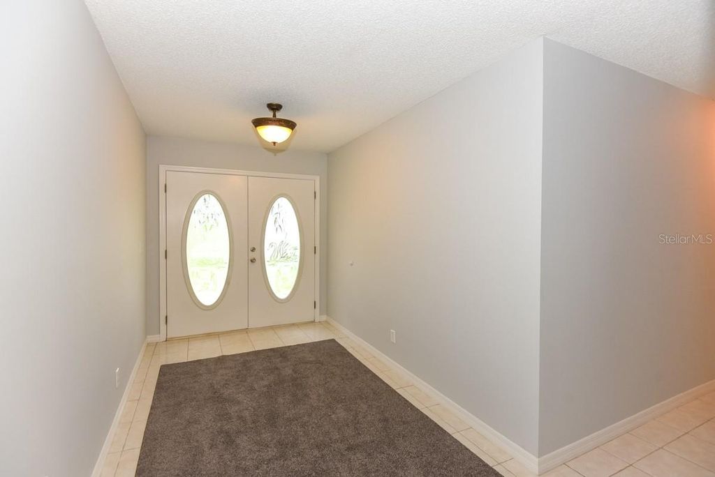 Photo of 24 Lake Vista Way, Ormond Beach, FL 32174 (MLS # TB8504029)