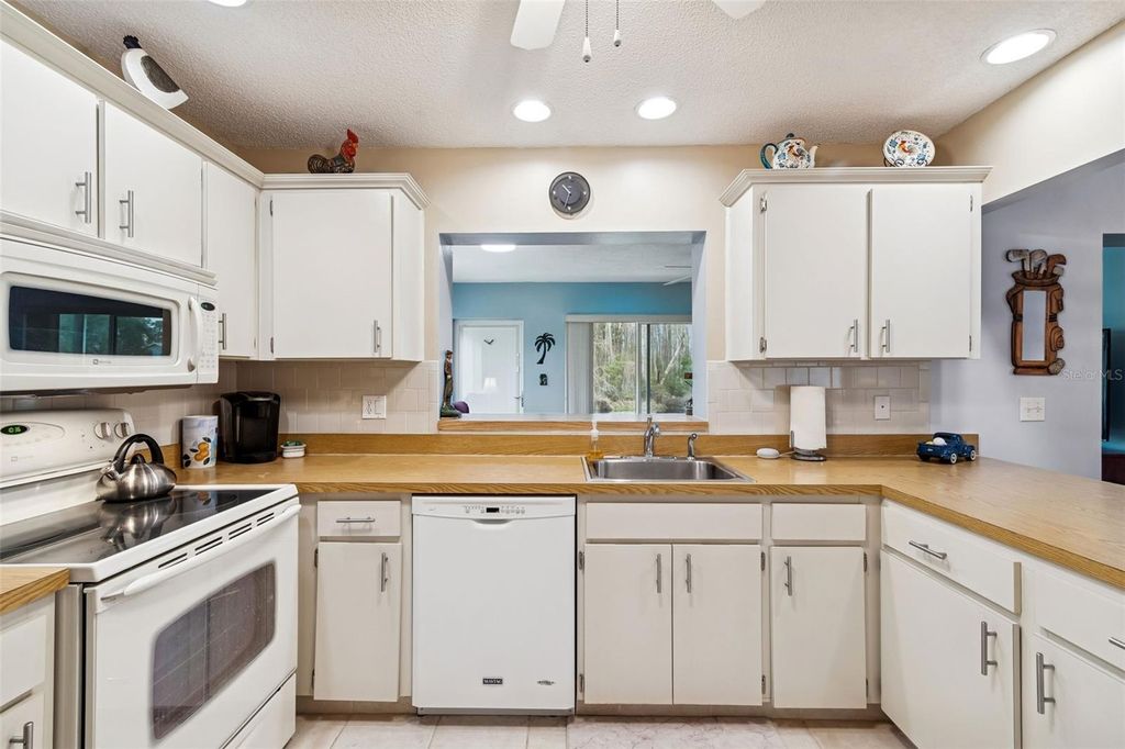 Photo of 11719 Alderwood Drive, New Port Richey, FL 34654 (MLS # TB8474267)