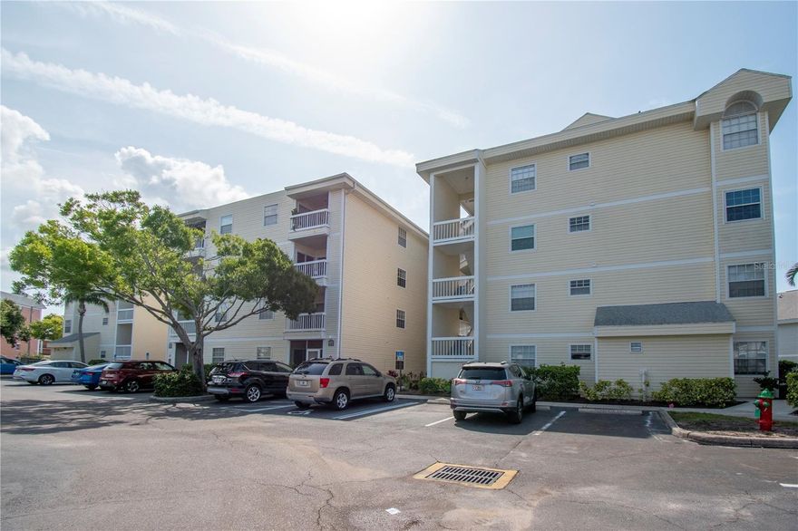 Welcome to Stone’s Throw, a centrally located and well-kept community in the heart of St. Petersburg. This second-floor 2-bedroom, 2-bathroom condo offers a peaceful retreat with tranquil pond and fountain views from your private lanai. Inside, you’ll find a bright, open layout filled with natural light. The kitchen features modern appliances and updated countertops, while new vinyl flooring runs throughout the home, giving it a fresh, move-in-ready feel. A full-size washer and dryer add everyday convenience. Enjoy easy living with an HOA that covers water, sewer, trash, cable, internet, exterior and roof maintenance, and pest control—providing a truly low-maintenance lifestyle. Stone’s Throw is an all-ages community with a strong lineup of amenities, including a large pool with sundeck, heated spa, clubhouse, tennis and pickleball courts, and a car wash area. There is also ample open parking for residents and guests. The location offers exceptional convenience—just minutes from Tyrone Square Mall, a movie theater, and numerous dining options. The Gulf beaches, including Madeira Beach, St. Pete Beach, and Treasure Island, are a short drive away, along with downtown St. Petersburg. For outdoor recreation, enjoy nearby access to the Pinellas Trail and the popular Azalea Farmers Market. This is a great opportunity to own an updated condo in a prime location that combines comfort, convenience, and community.