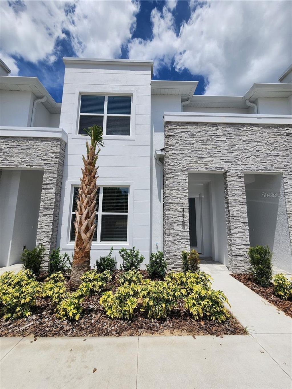 Photo of 1416 Wanderlust Lane, Clermont, FL 34714 (MLS # R4910723)